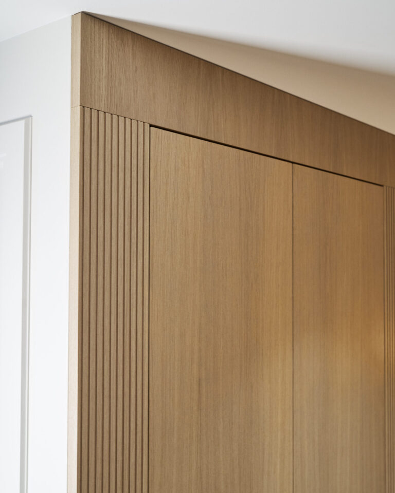 Wooden paneling with vertical grooves